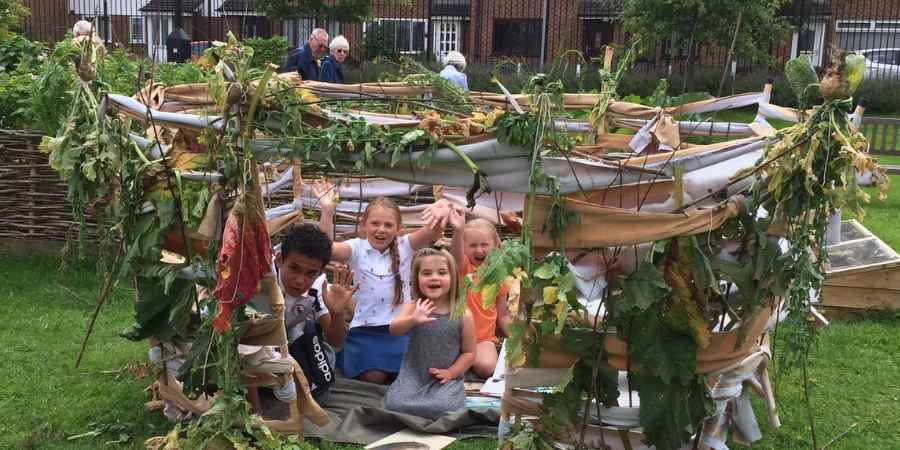 Children playing in a den.