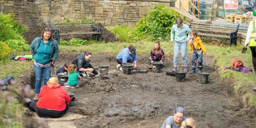 Achaeologists at a dig.
