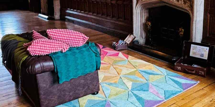 Chair with a blanket and book.