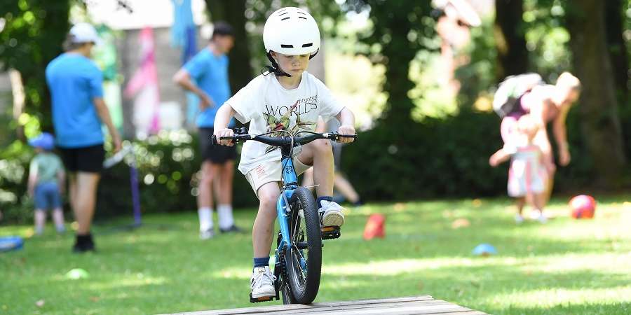 Child riding a bicycle.