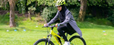 Person riding a bike.