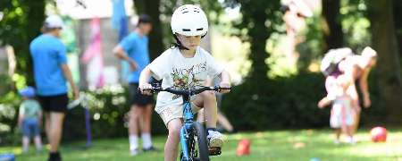 Child riding a bike.