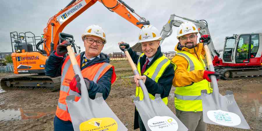 Anthony Dillon, Paul Waugh MP and Councillor Danny Meredith holding shovels at the construction site.