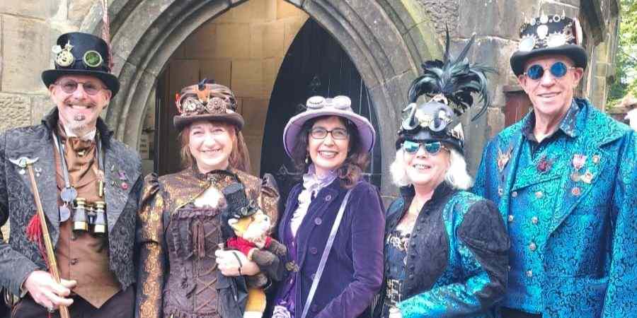 Visitors dressed in steampunk outfits.
