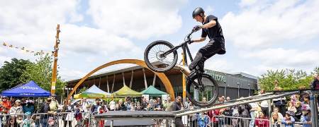 BMX rider performing for a crowd.