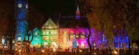 Rochdale Town Hall lit up at night.