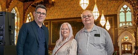 Andy Burnham, Councillor Sue Smith and Councillor Neil Emmott in the town hall.