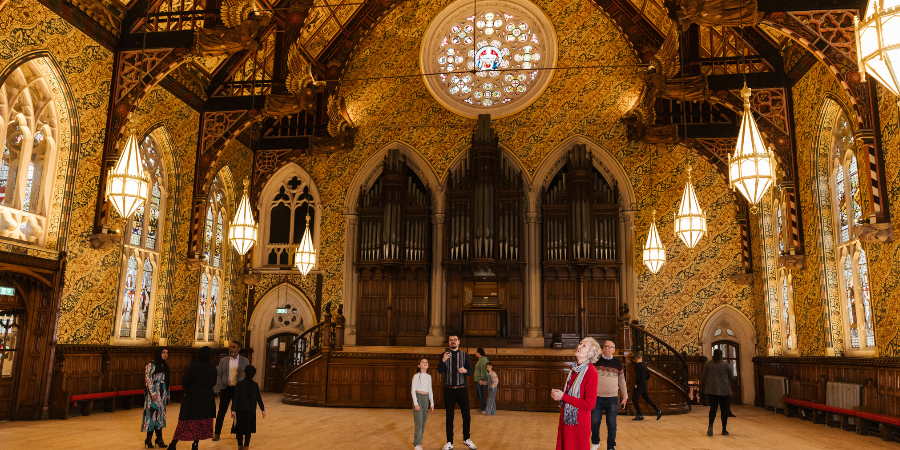 Visitors examining the Great Hall.