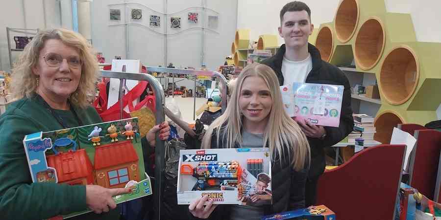 Helen Walton with staff from RRG Toyota Rochdale.