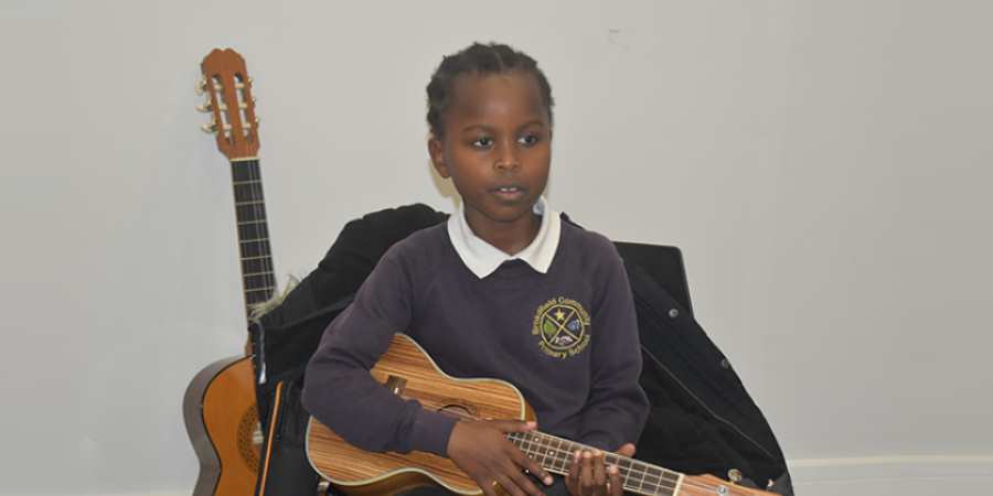 Student in an ukulele class.