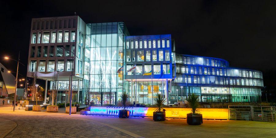 Number One Riverside lit up in the colours of the Ukrainian national flag.