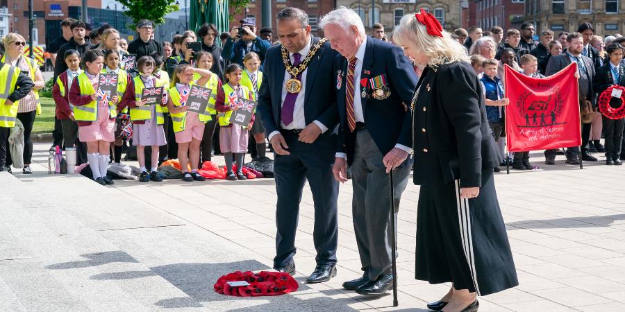 Councillor Shakil Ahmed, Kenneth Wright and Louise Scott at the Cenotaph.