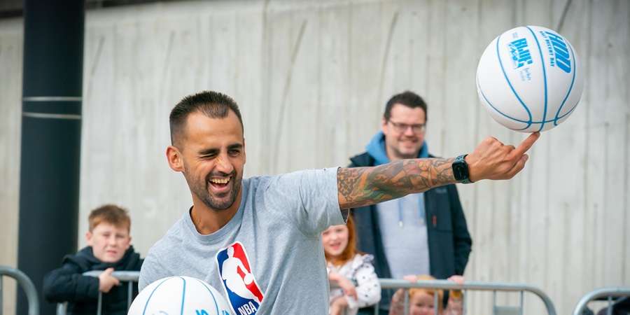 Performer with basketball.