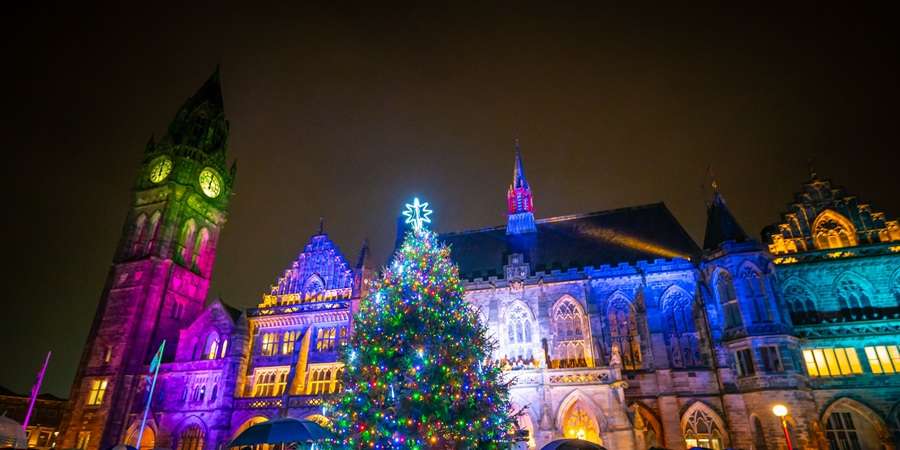 Rochdale Town Hall lit up at night.