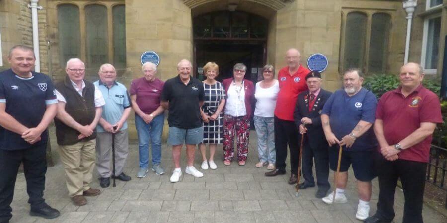 Councillor Janet Emsley with veterans.