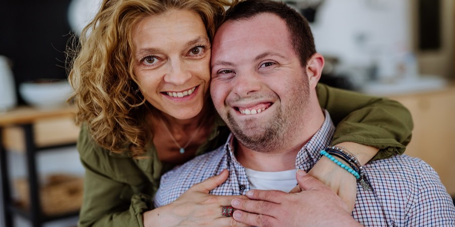 2 adults, one with autism.