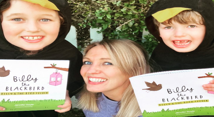Jennifer Doyle with 2 children dressed as blackbirds.
