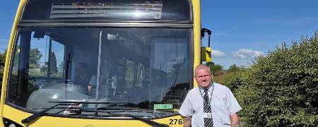 Phil Burke with a 125 bus.