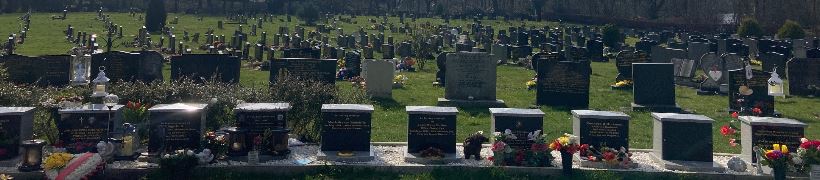 A row of gravestones at Middleton Cemetery.