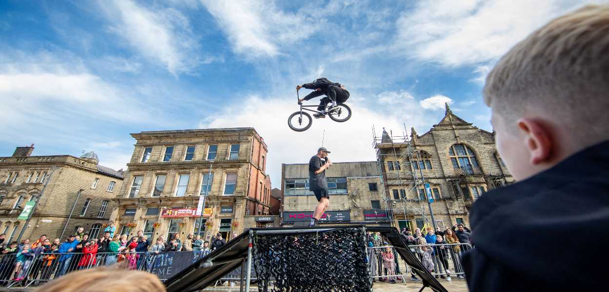 BMX rider performing stunt.