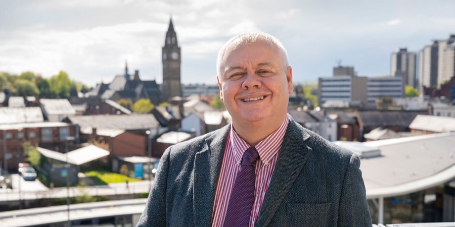 Councillor Neil Emmott on the roof of the council offices.