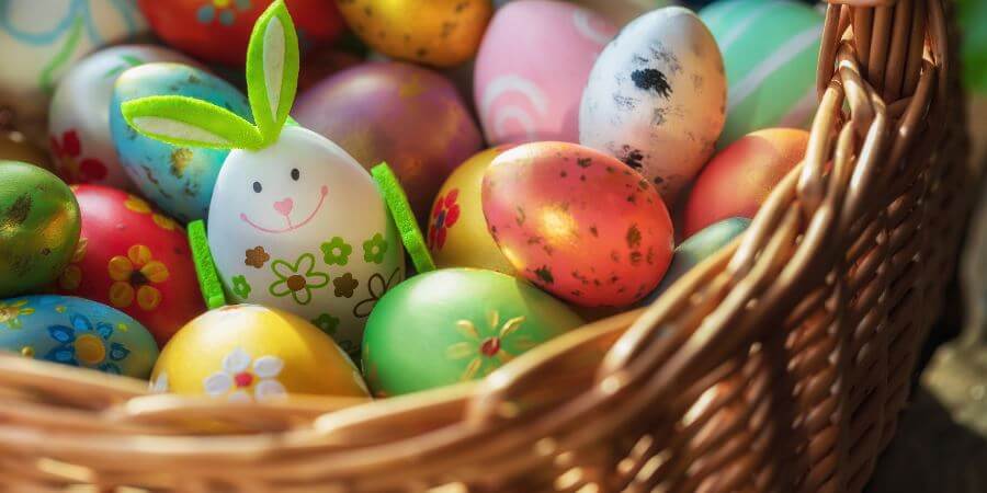 A basket of colourful Easter eggs.