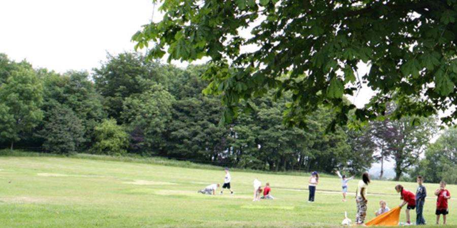 Families playing at Falinge Park.