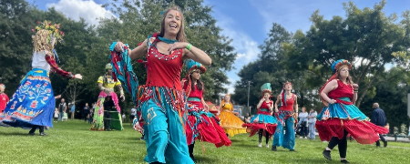 Dancers in colourful costumes.