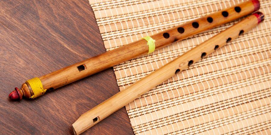 2 fifes on a bamboo mat. 