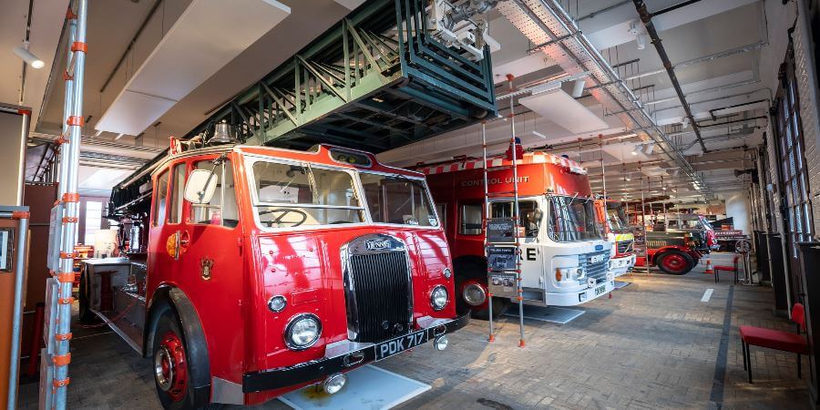 A row of vintage fire engines.