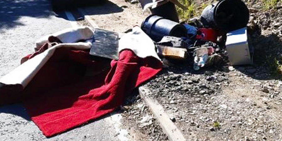 Fly-tipped rubbish on Ashworth Road in Rochdale.