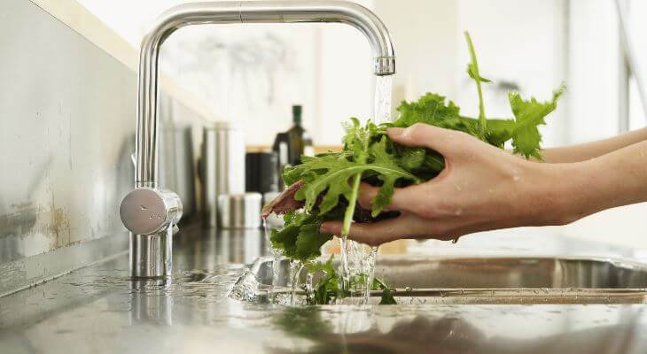 Salad leaves being washed.