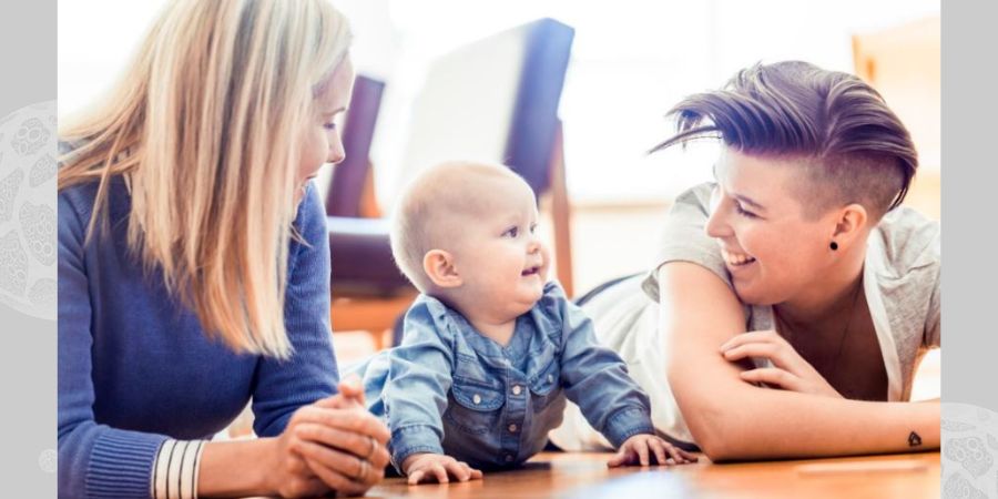 2 foster mums with a baby.