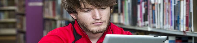 A library customer using a tablet.