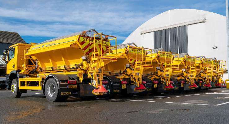 A row of gritting lorries parked outside the Princess Road depot.