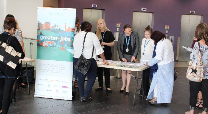 Visitors to a council recruitment event.