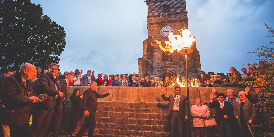 The Jubilee beacon being lit in Middleton's Jubilee Park.
