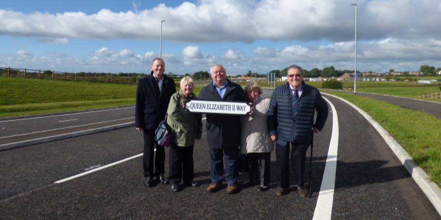 Councillors stood on Queen Elizabeth 2 way.