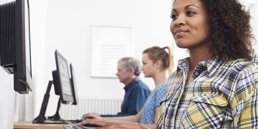 Adults in a computer class.