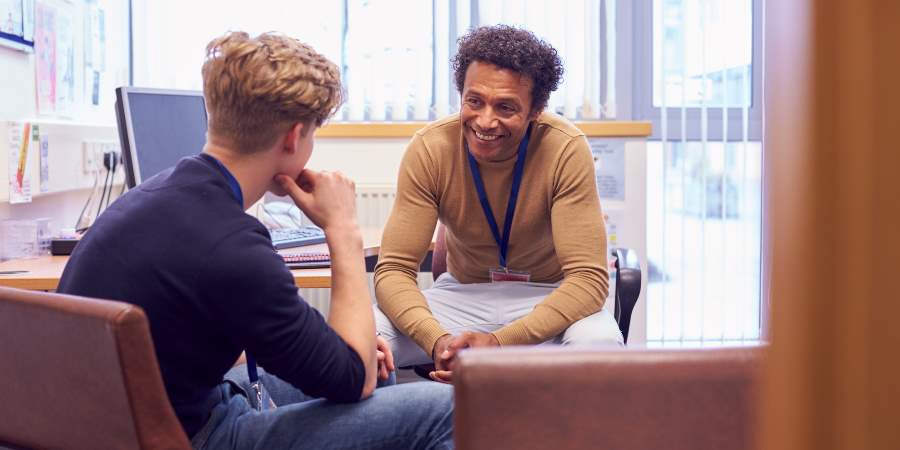 A resident meeting a counsellor.