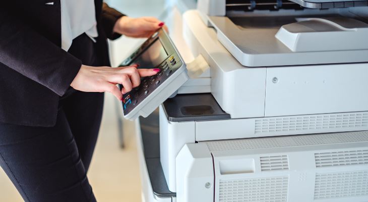 A photocopier being used.
