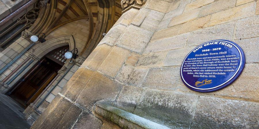 The purple plaque at Rochdale Town Hall.