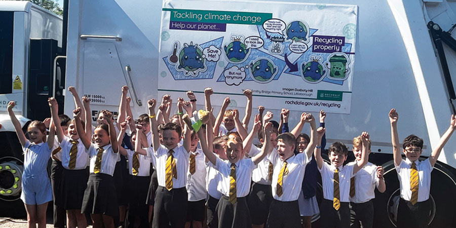 Year 5 pupils at Smithy Bridge Primary School  celebrate winning one of our regular recycling drawing competitions.