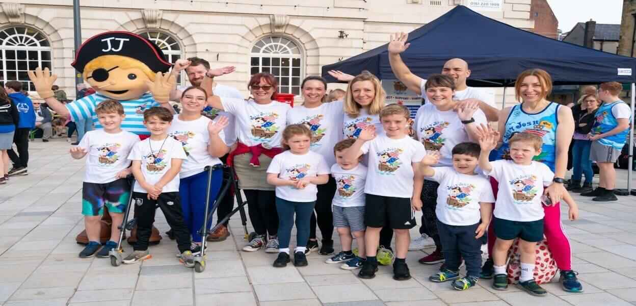 A group that took part in the fun run to raise money for Jolly Josh.