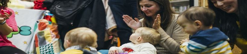 Parents and children at a play group.