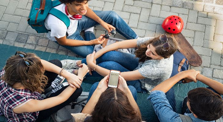 Young children sat around in discussion.