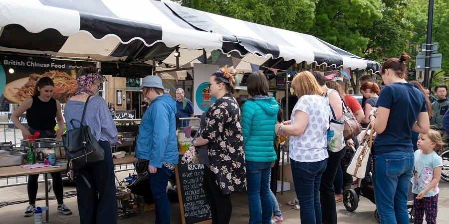 Visitors to Street Eat in 2019 queuing up outside a food stall.