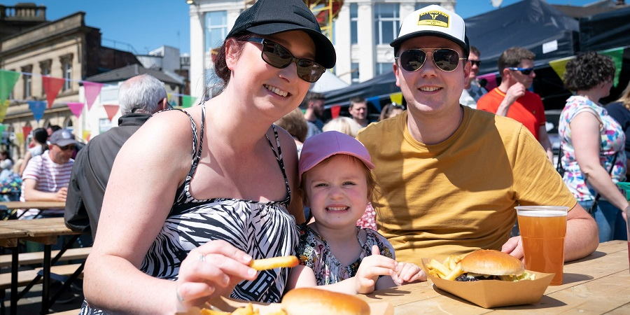 A family visiting Street Eat in 2023.