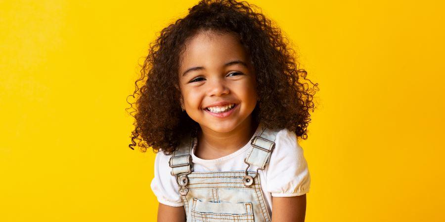 A smiling young girl.