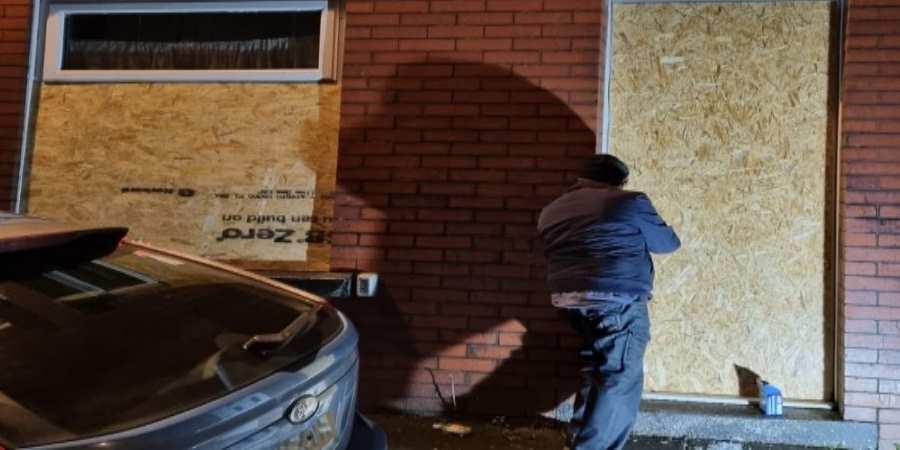 The problem property being boarded up.